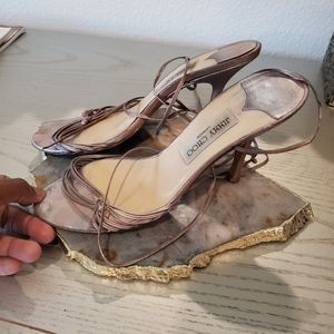 Well-worn metallic strappy Jimmy Choo